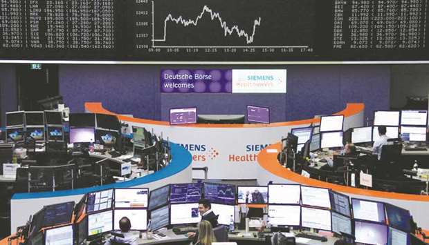 A view of the DAX board in the Frankfurt Stock Exchange. Frankfurt stocks climbed 0.4% at 12,389.58 points yesterday.