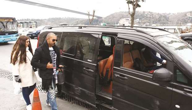 Uber driver Irfan Er picking up his passengers in Istanbul. In their court action, cabbies accuse Uber of running an u201cunlicensed taxi serviceu201d in Turkey and want the app banned.