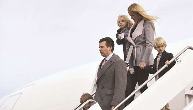 This file photo taken on January 19 last year shows Donald Trump Jr with his wife Vanessa and their children stepping off a plane upon arrival at Andrews Air Force Base in Maryland.
