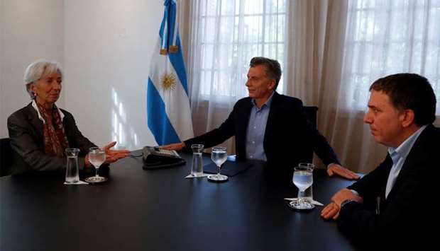 Christine Lagarde, Managing Director of the IMF, Argentina's President Mauricio Macri and Minister of the Tresuary Nicolas Dujovne