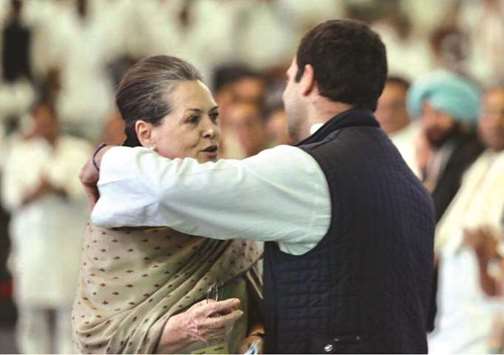 Congress president Rahul Gandhi embraces his mother and UPA chairperson Sonia Gandhi during the 84th plenary session of the party in New Delhi yesterday.