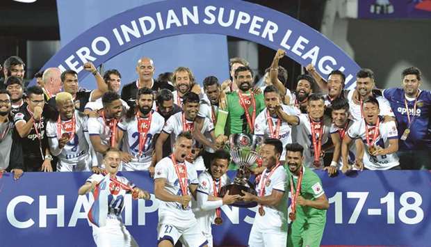 Chennayin FC players celebrate after their 3-2 victory against Bengaluru FC in the final of ISL in Bengaluru yesterday. (AFP)