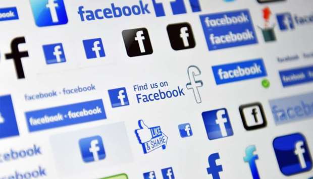 Shows logos of  social media and social networking service Facebook