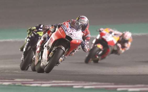 Ducati Teamu2019s Italian rider Andrea Dovizioso leads the pack during the Qatar MotoGP Grand Prix at the Losail International Circuit yesterday. PICTURES: Noushad Thekkayil and agencies