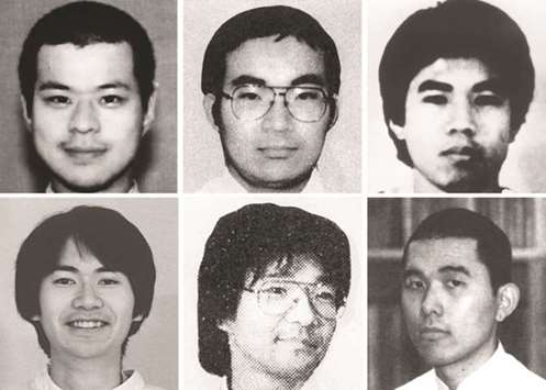This combo of photos received via Jiji Press shows former Aum Supreme Truth doomsday cult officer Tomomasa Nakagawa (top L), former cult officer Masato Yokoyama (top C), former cult officer Satoru Hashimoto (top R), former cult officer Kenichi Hirose (bottom L), former cult officer Seiichi Endo (bottom C) and former cult officer Toru Toyoda (bottom R) at unknown locations in Japan.