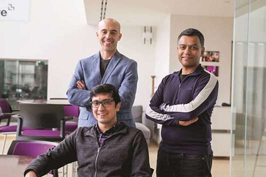 TRIO: From left, Soroush Vosoughi (seated), a postdoc at the Media Labu2019s Laboratory for Social Machines; Sinan Aral, the David Austin Professor of Management at MIT Sloan; and Deb Roy, an associate professor of media arts and sciences at the MIT Media Lab, who also served as Twitteru2019s Chief Media Scientist from 2013-2017.