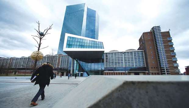 European Central Bank headquarters building is seen in Frankfurt. After more than three years of bond buying totalling nearly u20ac2.5tn, ECB policymakers are now debating how to phase out their unconventional tools and normalise policy in a time of robust growth but weak inflation.