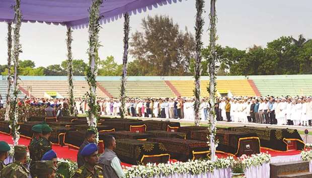 Relatives and army personnel offer funeral prayer for the victims of the US-Bangla plane crash as the bodies were brought back to Dhaka yesterday, following the March 12 crash in Kathmandu.