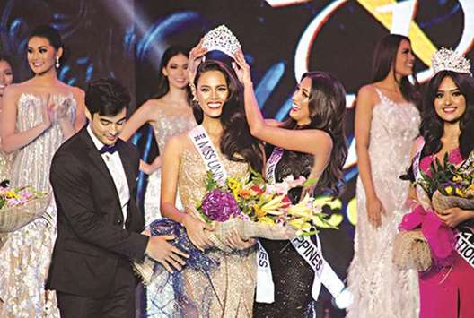 Catriona Gray is crowned Miss Universe Philippines 2018 by Miss Universe Philippines 2017 Rachel Peters during the Binibining  Pilipinas coronation night on Sunday.
