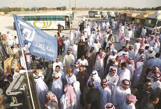 People gather at an auction for vehicles and other possessions belonging to billionaire Maan al-Sanea and his company in Dammam on Sunday. The  businessman, ranked in 2007 by Forbes as one of the worldu2019s 100 richest, was detained by authorities late last year for unpaid debt dating back to 2009.