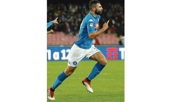 Napoliu2019s Raul Albiol celebrates after scoring against Genoa in Serie A at the Stadio San Paolo in Naples, Italy. (Reuters)