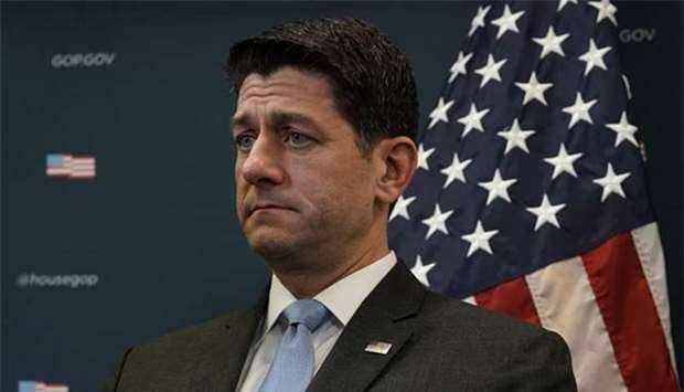 US House Speaker Paul Ryan listens during a news briefing in Washington, DC on Tuesday.