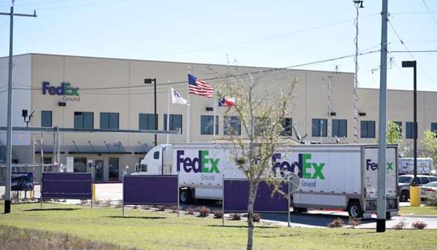 A FedEx truck is seen outside FedEx facility following the blast, in Schertz, Texas, US