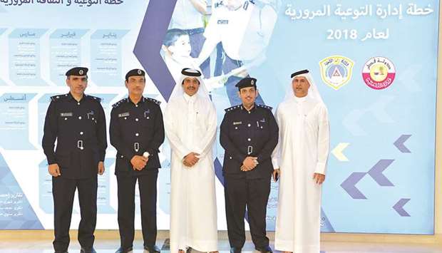 Dignitaries from Doha Bank and the Traffic Department at the Ministry of Interior.