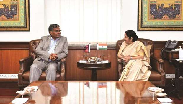 Nepalu2019s Industry, Commerce and Supplies Minister Matrika Yadav calls on India External Affairs Minister Sushma Swaraj in New Delhi.