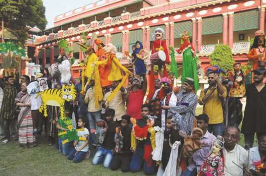 Artists take part in the World Puppet Day celebrations at Jorasanko Thakur Bari in Kolkata yesterday.