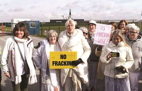 Anti-fracking protesters are joined by actresses Emma Thompson during a protest march at the Preston New Road drill site where energy firm Cuadrilla have set up fracking (hydraulic fracturing) operations at Little Plumpton, near Blackpool, in northwest England yesterday.