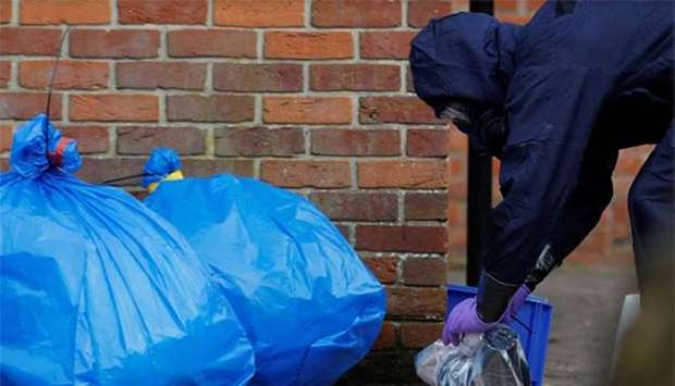 Bags containing protective clothing are seen after inspectors visited the scene of the nerve agent attack on former Russian agent Sergei Skripal, in Salisbury.