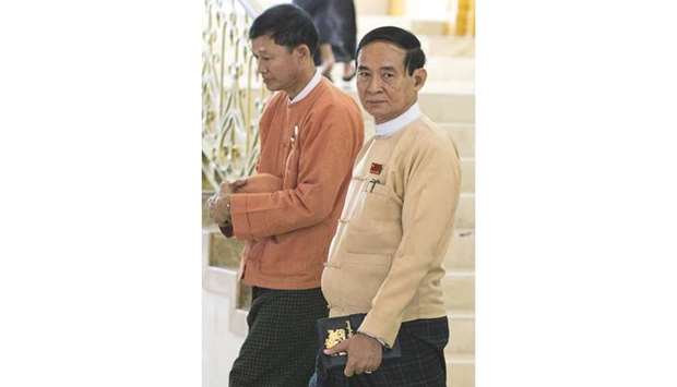 Win Myint, who recently resigned his post of speaker of the Lower House of Parliament, leaves the parliament, in Naypyitaw, Myanmar, yesterday.