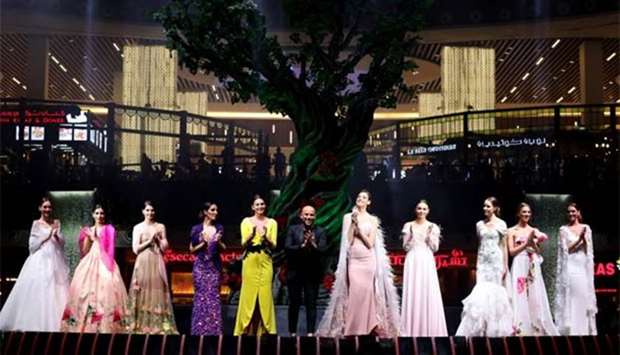 Renowned Spanish fashion designer Alejandro Resta is seen with models at Mall of Qatar's first-ever Spring/Summer Fashion Festival on Thursday. PICTURE: Sajith Orma.
