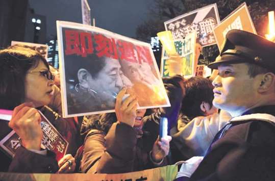 Protesters stage a demonstration near the prime ministeru2019s official residence in Tokyo yesterday.