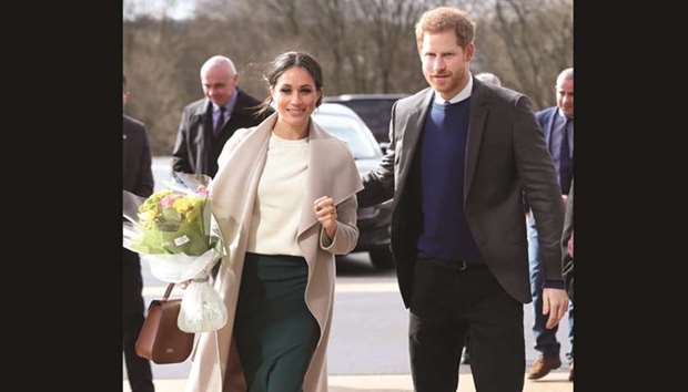 Prince Harry and fiancee Meghan Markle arrive at the Eikon Centre in Lisburn, Northern Ireland, yesterday to attend an event to mark the second year of youth-led peace-building initiative Amazing the Space.