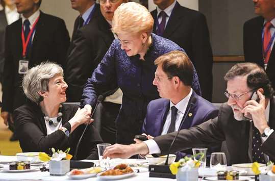 Prime Minister Theresa May, Lithuaniau2019s President Dalia Grybauskaite, Sloveniau2019s Prime Minister Miro Cerar and Spainu2019s Prime Minister Mariano Rajoy attend a European Union leaders summit in Brussels, Belgium, yesterday.