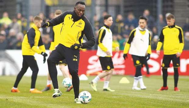 Usain Bolt participates in a training session with Borussia Dortmund at the Strobelallee Training Centre in Dortmund yesterday. (Reuters)