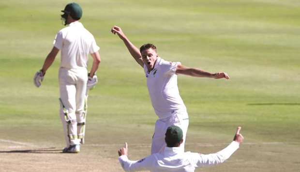 South Africau2019s Morne Morkel celebrates taking the wicket of Australiau2019s Shaun Marsh.