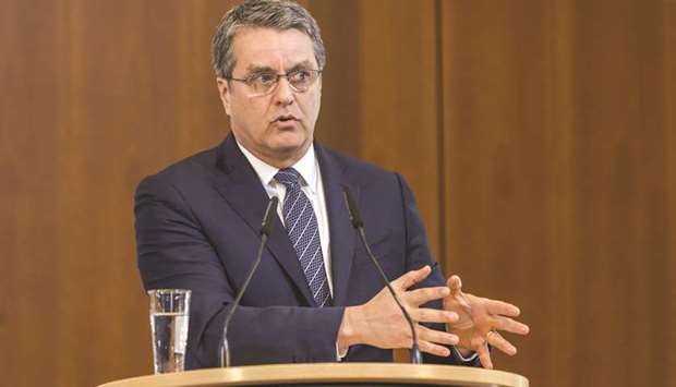 WTO director-general Roberto Azevedo speaks during a news conference in Berlin (file). u201cDisrupting trade flows will jeopardise the global economy at a time when economic recovery, though fragile, has been increasingly evident around the world,u201d Azevedo said in a statement.