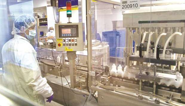 A GlaxoSmithKline Canada employee bottles Ziagen, an HIV oral liquid medicine, on the liquids packaging line at the companyu2019s Canadian headquarters in Mississauga, Ontario. GSK and Reckitt are under shareholder pressure to exercise financial discipline, while other potential suitors, such as Bayer and Sanofi are busy with other projects.