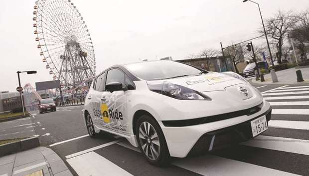 A self-driving car, based on Nissan Leaf electric vehicle, for Easy Ride service, developed by Nissan and mobile gaming platform operator DeNA, is seen during its media preview in Yokohama. Launched as the worldu2019s first mass-market all-battery EV in 2010, Leaf compact hatchback is the worldu2019s best-selling EV, though sales have been just around 300,000 units in its lifetime.