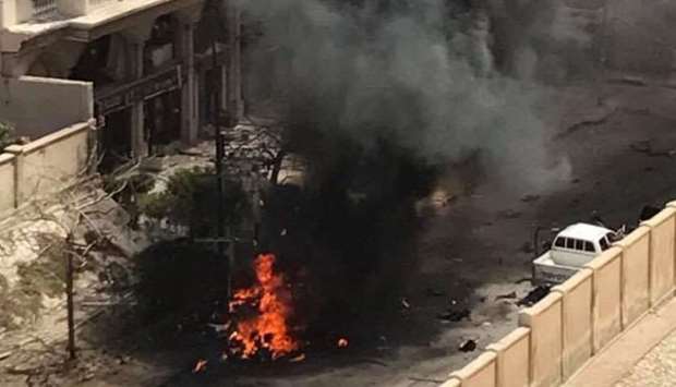 Photos on social media showed a burnt out car and smoke at the site of the blast.