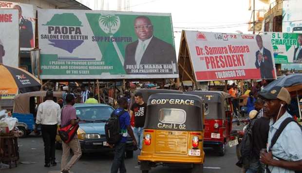 Electoral posters of the two presidential candidates, Julius Maada Bio and Samura Kamara who will face off during the second round of elections