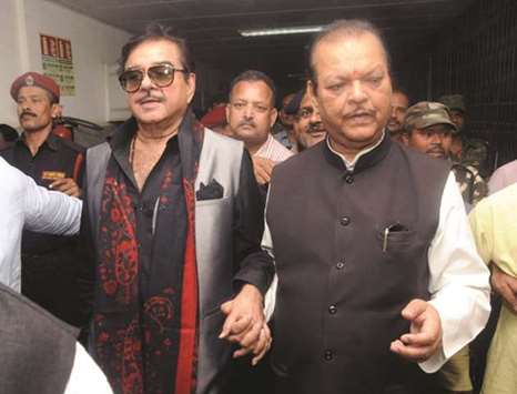 Bharatiya Janata Party MP Shatrughan Sinha and former central minister Subodh Kant Sahay come out of the Rajendra Institute of Medical Sciences after meeting RJD chief Lalu Prasad Yadav, in Ranchi yesterday.