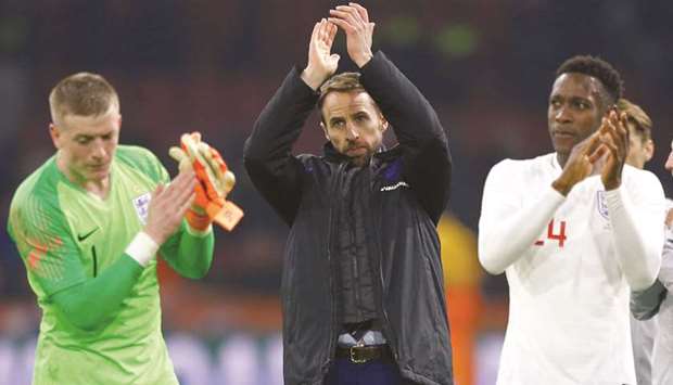 England manager Gareth Southgate applauds fans after the friendly match against the Netherlands on Friday. (Reuters)