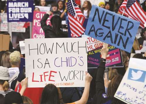 Protesters participate in the March for Our Lives rally at Las Vegas City Hall on Saturday.