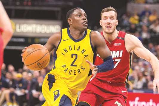 Indiana Pacers guard Darren Collison (left) dribbles the ball against Miami Heat guard Goran Dragic in the second-half of their NBA game at Bankers Life Fieldhouse in Indianapolis. PICTURE: USA TODAY Sports
