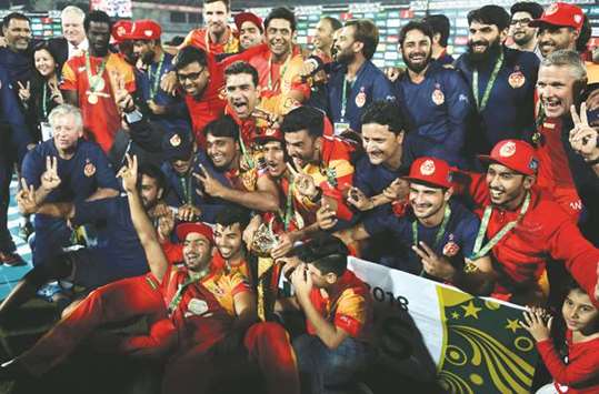Islamabad United players celebrate after their win over Peshawar Zalmi in the Pakistan Super League final in Karachi. (AFP)