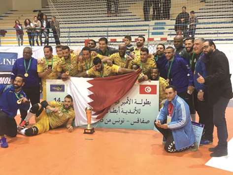Al Gharafa players celebrate after winning the 14th Arab Handball Cup championship in Sfax, Tunisia.