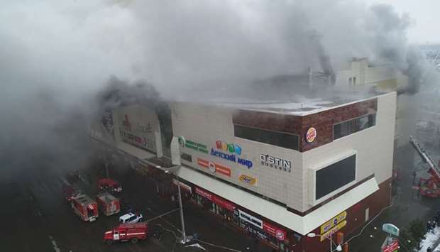 Still photo taken from video provided by Russian Emergencies Ministry shows a site of a fire at a shopping mall in Kemerovo, Russia.