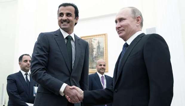 Russian President Vladimir Putin greeting His Highness the Emir Sheikh Tamim bin Hamad al-Thani at the Kremlin on Monday