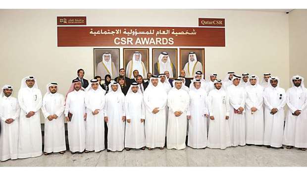 The CSR award winners with HE the Minister of Economy and Commerce Sheikh Ahmed bin Jassim bin Mohamed al-Thani, other dignitaries and QU officials. PICTURE: Shemeer Rasheed