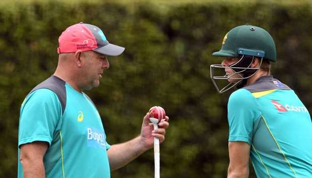 Australia's cricket coach Darren Lehmann (L) chatting with captain Steve Smith (R) in the nets during training at the SCG in Sydney. File photo: January 3, 2018