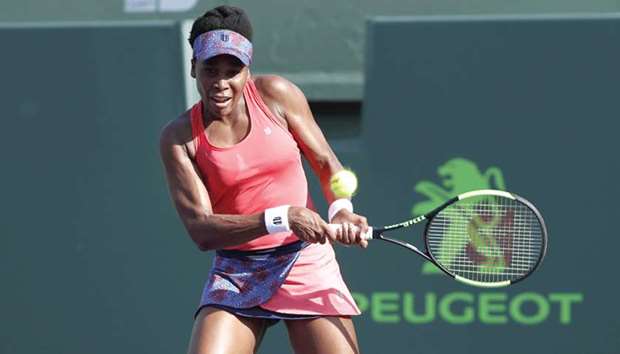 Venus Williams of the United States hits a backhand against Johanna Konta of Great Britain (not pictured) at the Miami Open on Monday.