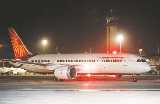 An Air India Boeing 787-8 Dreamliner plane lands at the Ben Gurion International airport in Tel Aviv, Israel. The airline has been unprofitable since its 2007 merger with Indiau2019s state-owned domestic operator Indian Airlines.
