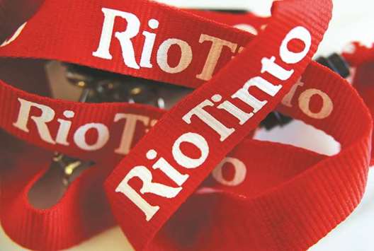 A lanyard with the Rio Tinto logo is arranged for a photograph in Melbourne. Rio completed its exit from coal with a bang, agreeing to sell more than $4bn of Australian mines in just a week.