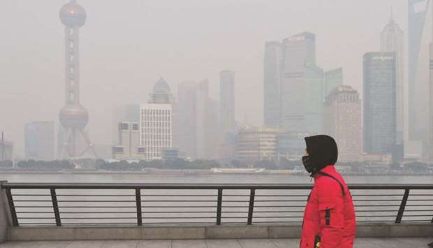 Smog over Shanghai in January this year as the air quality index reached 235 and authorities issued a u2018yellow warningu2019.