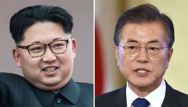 North Korean leader Kim Jong Un (L) and South Korea's President Moon Jae-In