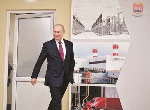 Putin arriving for a ceremony yesterday to launch the Mayakovskaya and Talakhovskaya thermal power plants in Russiau2019s Kaliningrad region.